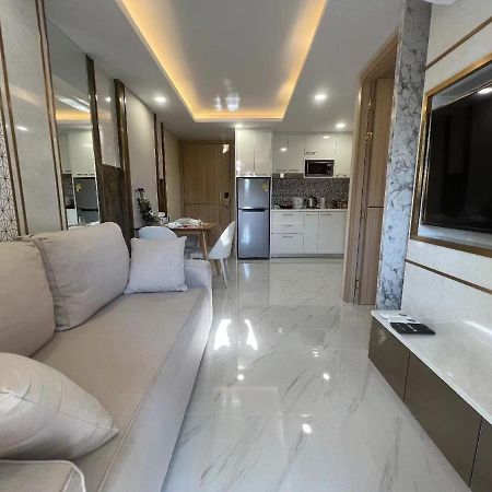 Romantic Beach Apartment芭堤雅水系高档酒店式公寓可做饭 Praia de Jomtien Exterior foto