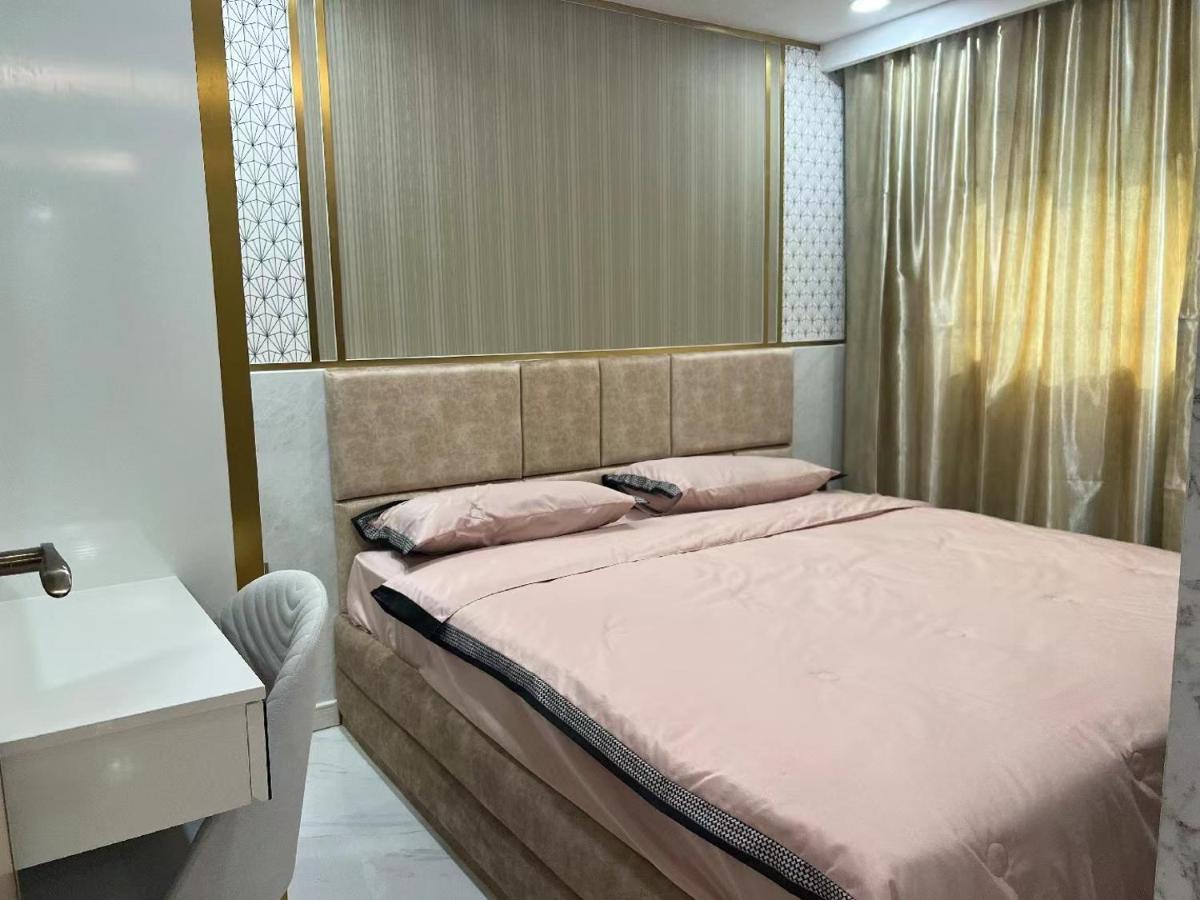 Romantic Beach Apartment芭堤雅水系高档酒店式公寓可做饭 Praia de Jomtien Exterior foto